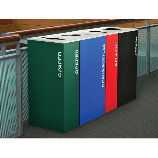 A row of rectangular paper recycling receptacles in different colors with white text.