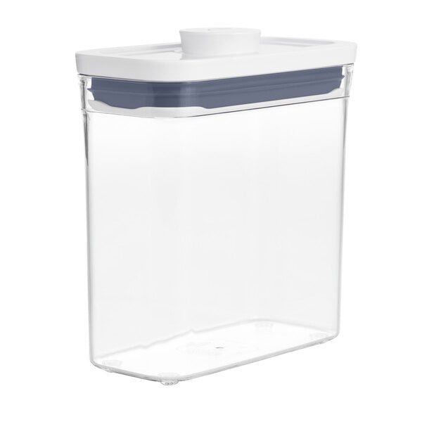 An OXO Good Grips clear rectangular plastic food storage container with a white lid.
