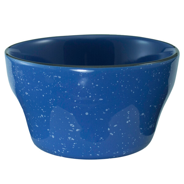 An International Tableware Campfire ocean blue stoneware bowl with white speckled specks.