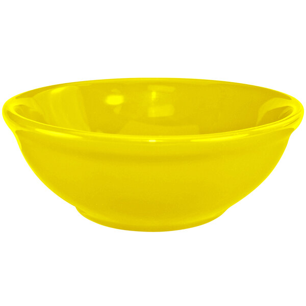 A close up of a yellow International Tableware stoneware bowl.