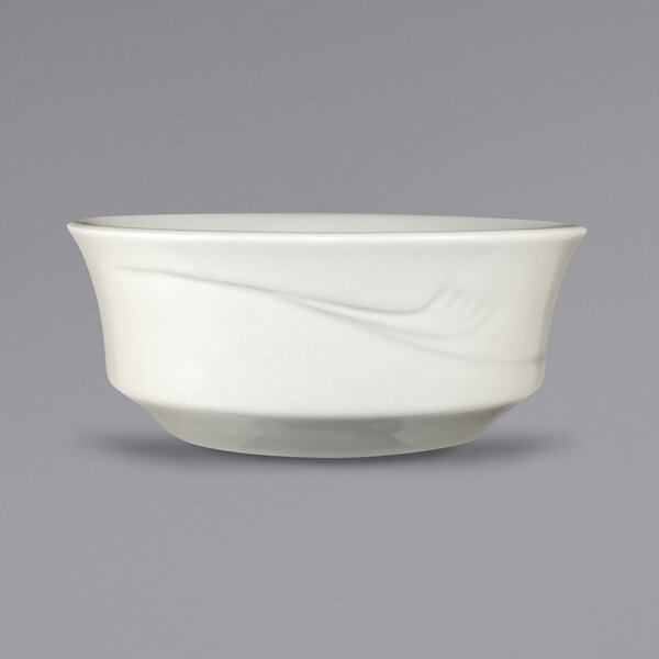 A white bowl with a curved edge and a swirl design.