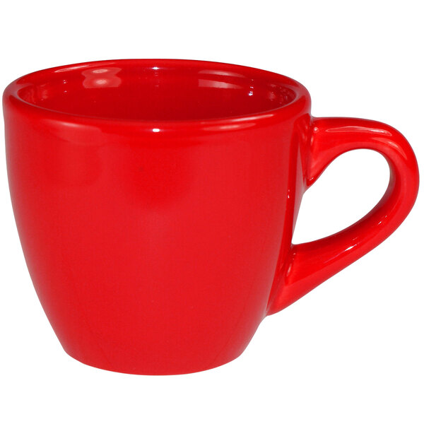 A close-up of a crimson red stoneware International Tableware demi espresso cup with a handle.