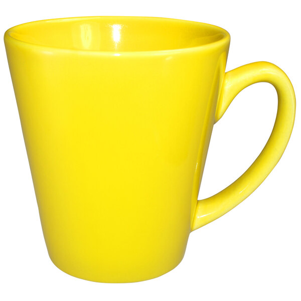 A yellow stoneware mug with a handle.