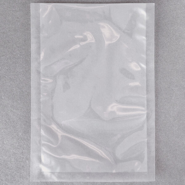 A clear plastic bag filled with ARY VacMaster vacuum packaging pouches.