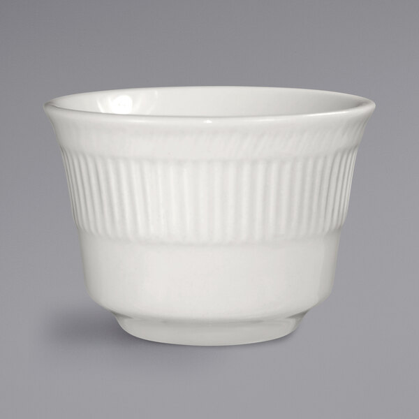 An International Tableware ivory stoneware bowl with a rippled design.
