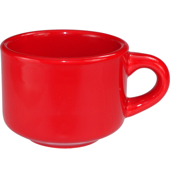 An International Tableware crimson red stoneware cup with a handle.