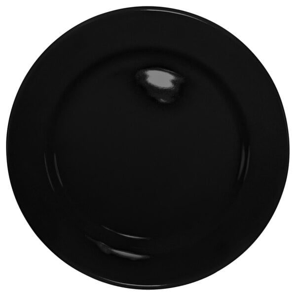 A black International Tableware stoneware plate with a rolled edge and wide rim.