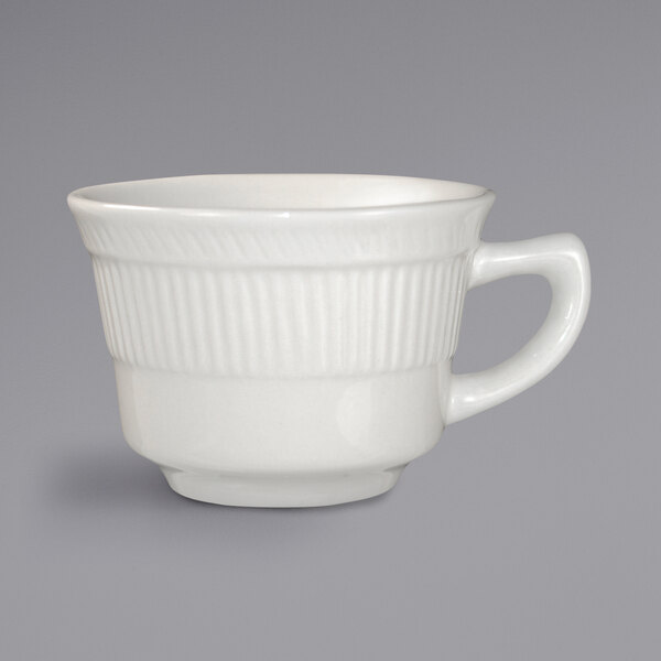 An International Tableware ivory stoneware cup with a handle.