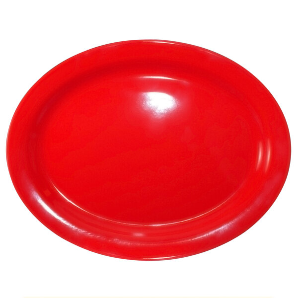 A crimson red oval stoneware platter.