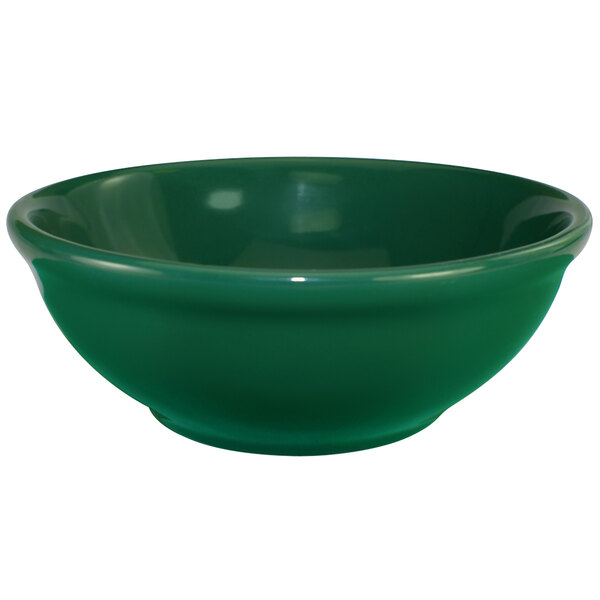 A green International Tableware stoneware bowl.