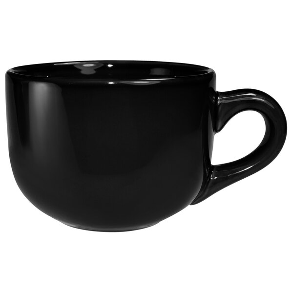 A black International Tableware stoneware latte cup with a handle.