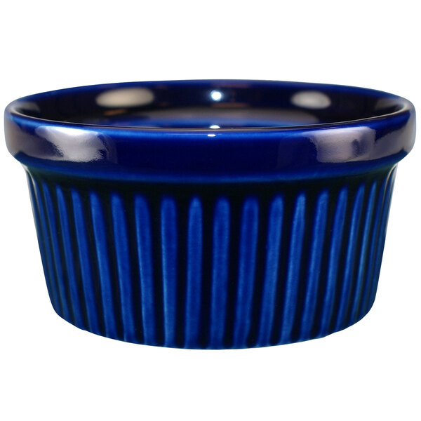A cobalt blue stoneware fluted ramekin.