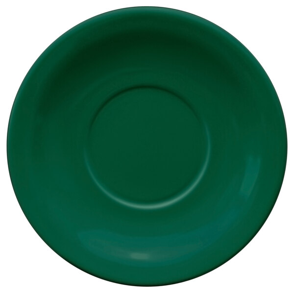 A green saucer with a white background.