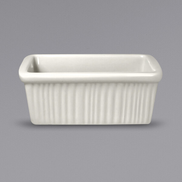 A white rectangular container with ribbed edges.