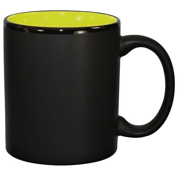 A black and yellow stoneware mug with a black rim and C-handle.