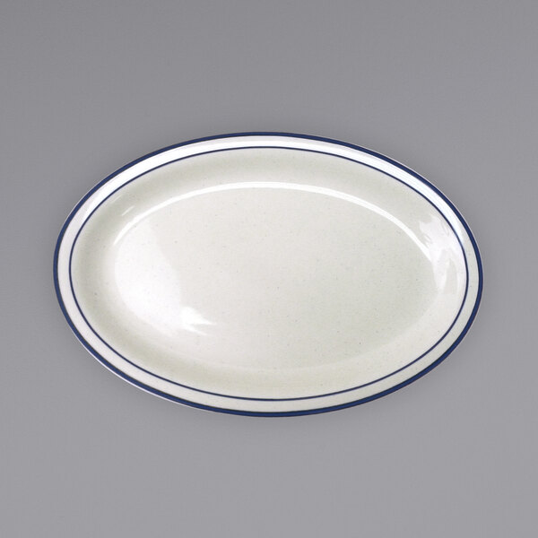 An International Tableware Danube ivory platter with blue bands on the rim.