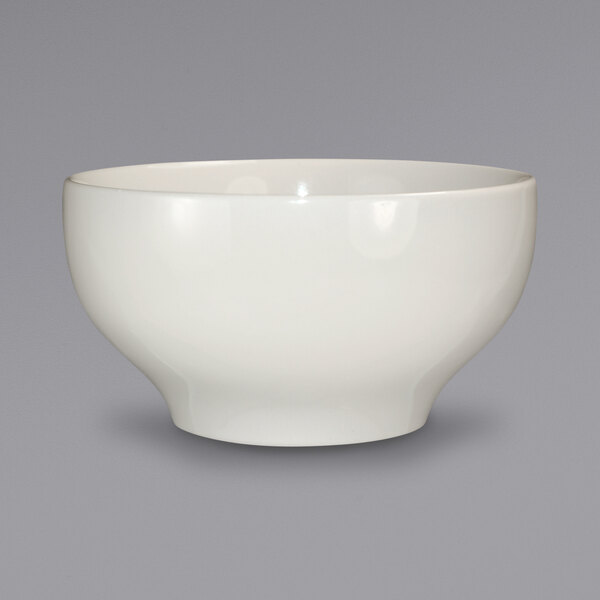 An International Tableware stoneware footed bowl with a rolled edge on a white background.