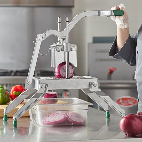A woman using a Garde onion slicer to cut a red onion.
