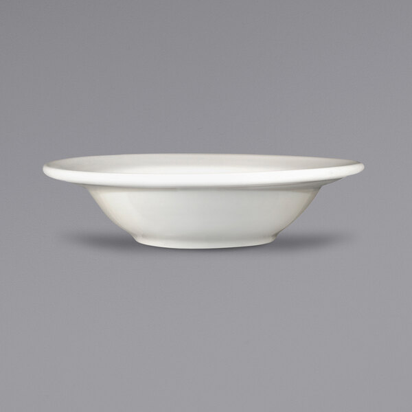 A white International Tableware Newport stoneware fruit bowl.