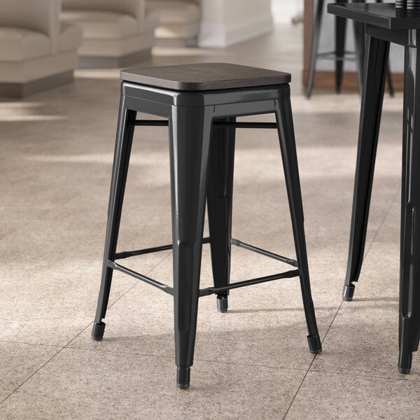 Lancaster Table & Seating Alloy Series Black Indoor Backless Counter Height Stool with Black Wood Seat