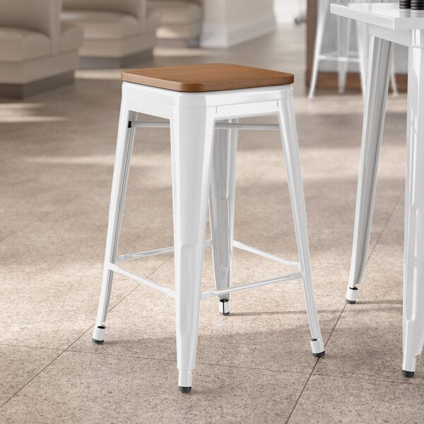 Lancaster Table & Seating Alloy Series White Indoor Backless Counter Height Stool with Walnut Wood Seat