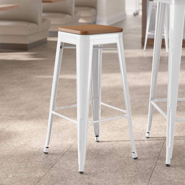 Lancaster Table & Seating Alloy Series White Indoor Backless Barstool with Walnut Wood Seat