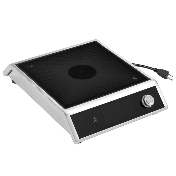 A black and white Vollrath medium-power induction range on a counter.