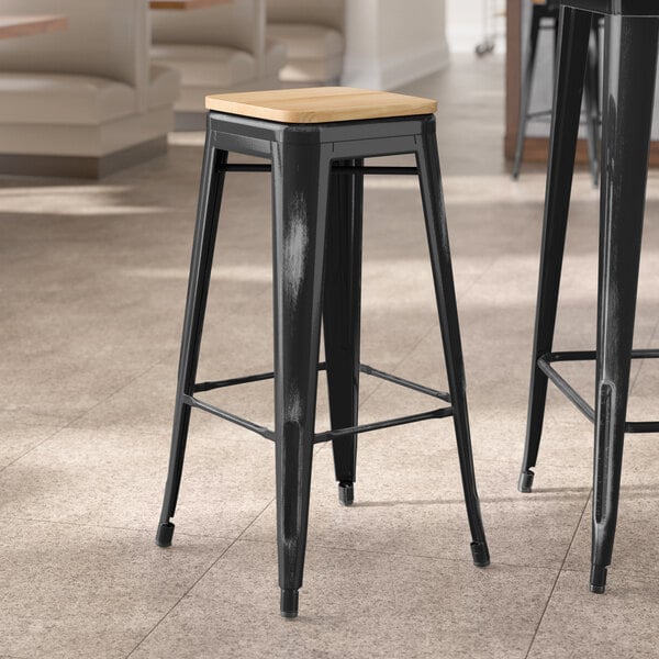 Lancaster Table & Seating Alloy Series Distressed Black Indoor Backless Barstool with Natural Wood Seat