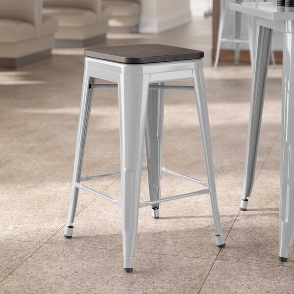 Lancaster Table & Seating Alloy Series Silver Indoor Backless Counter Height Stool with Black Wood Seat