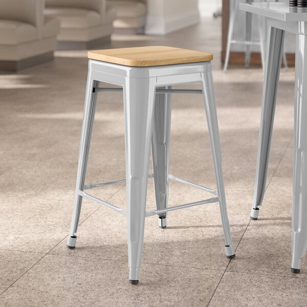 Lancaster Table & Seating Alloy Series Silver Indoor Backless Counter Height Stool with Natural Wood Seat