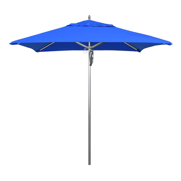 A California Umbrella with a Pacific Blue Sunbrella canopy on a metal pole.
