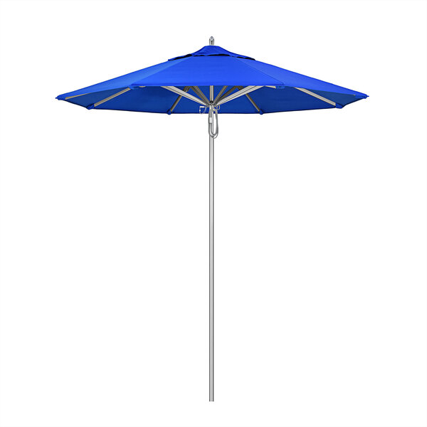 A California Umbrella with a Pacific Blue Sunbrella canopy on an aluminum pole.