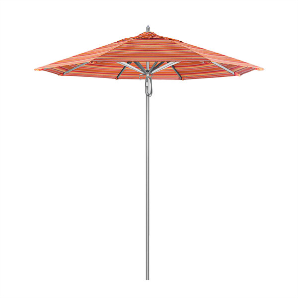 A California Umbrella with orange and white striped Sunbrella canopy on a metal pole.