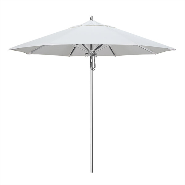 A white California Umbrella with a metal pole.