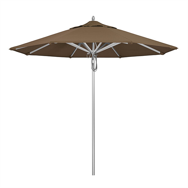 A California Umbrella with a brown Sunbrella canopy on a metal pole.
