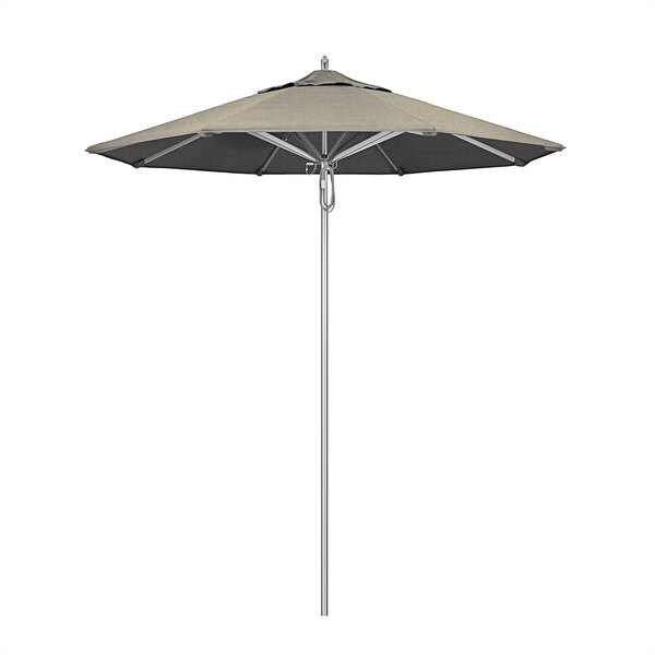 A California Umbrella with a Spectrum Dove Sunbrella canopy on a pole.