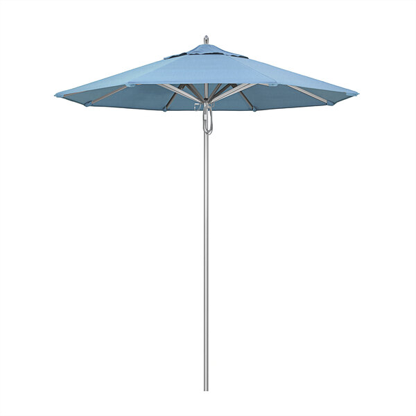 A California Umbrella Rodeo Series Sunbrella 1A table umbrella with Air Blue Sunbrella canopy on a metal pole.