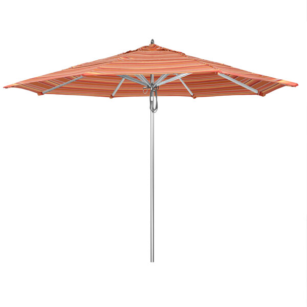 A California Umbrella on a metal pole with an orange striped Sunbrella canopy.