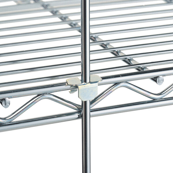 A Metro chrome wire shelving rod attached to a metal shelf.