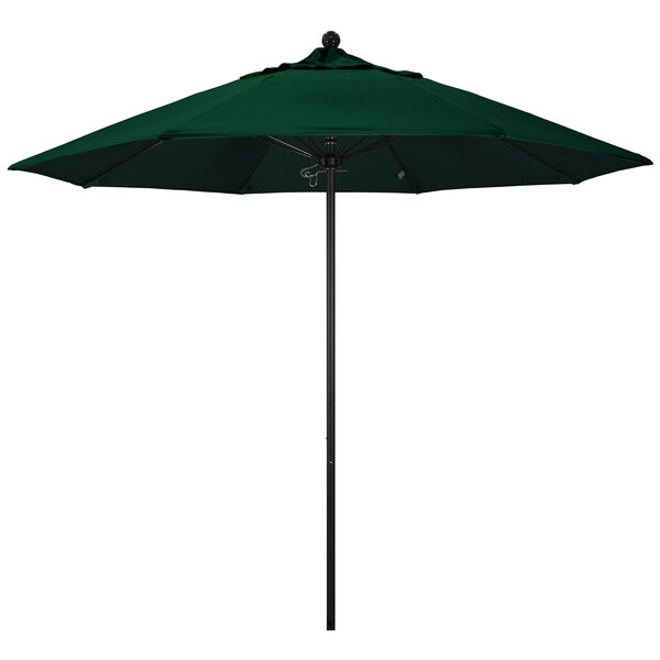 A forest green California Umbrella with a black aluminum pole.
