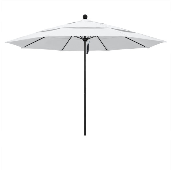 A white California Umbrella with a black pole.