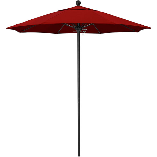 A California Umbrella Pacifica red umbrella on a black pole.