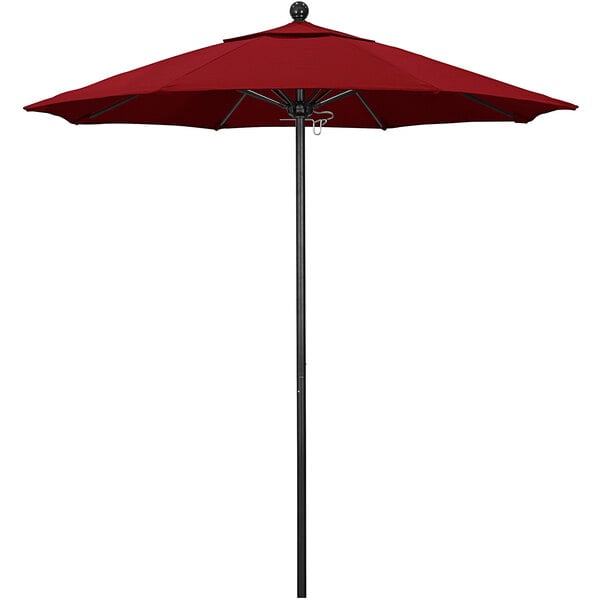 A red California Umbrella on a black aluminum pole.