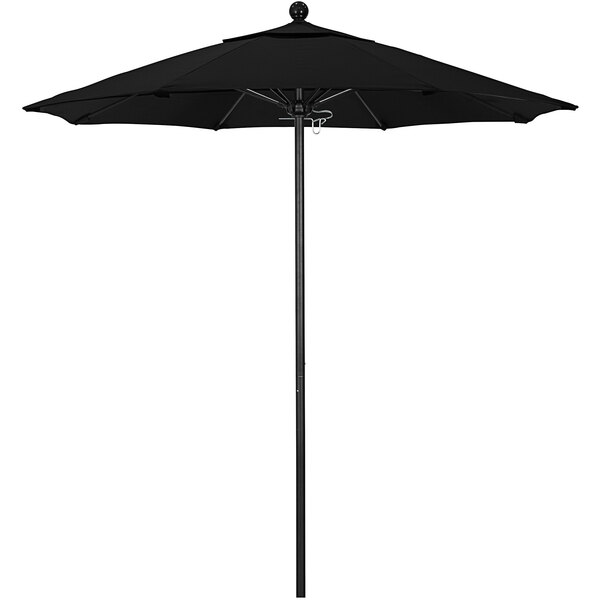 A black California Umbrella on a black metal pole.