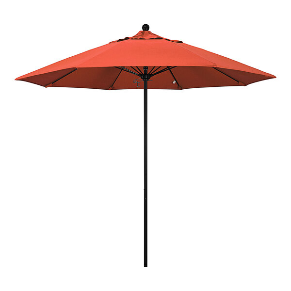 A sunset orange California Umbrella on a black pole.