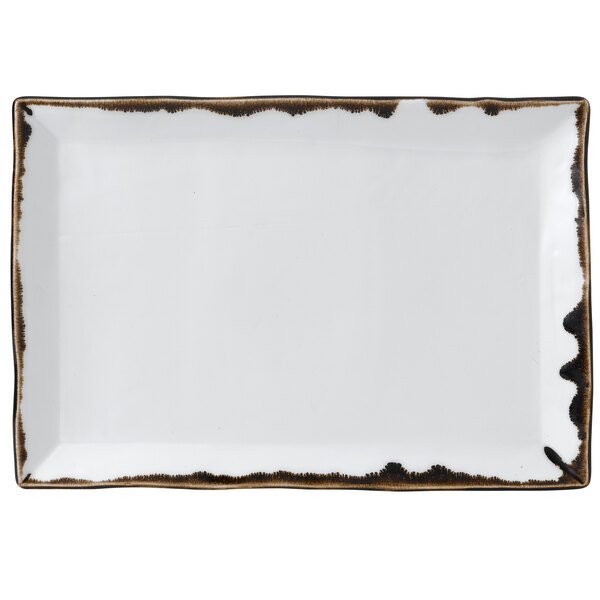 A white rectangular plate with brown edges.