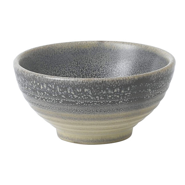 A close up of a Dudson Matte Granite round stoneware rice bowl with a gray and white speckled design.