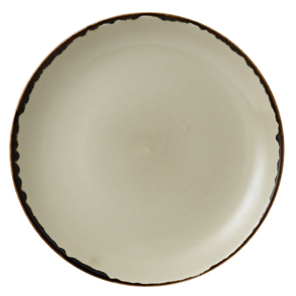 A close-up of a white Dudson Harvest china plate with a brown border.