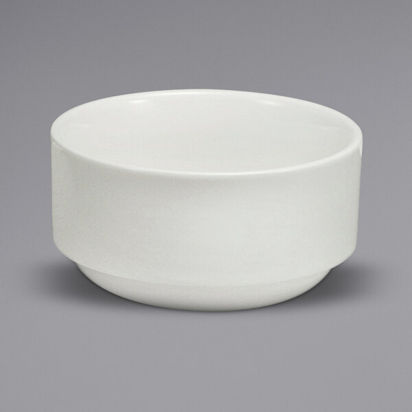 A white Sant' Andrea Cromwell porcelain bouillon cup on a gray surface.