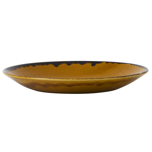 A brown Dudson Harvest deep coupe plate with a black rim.